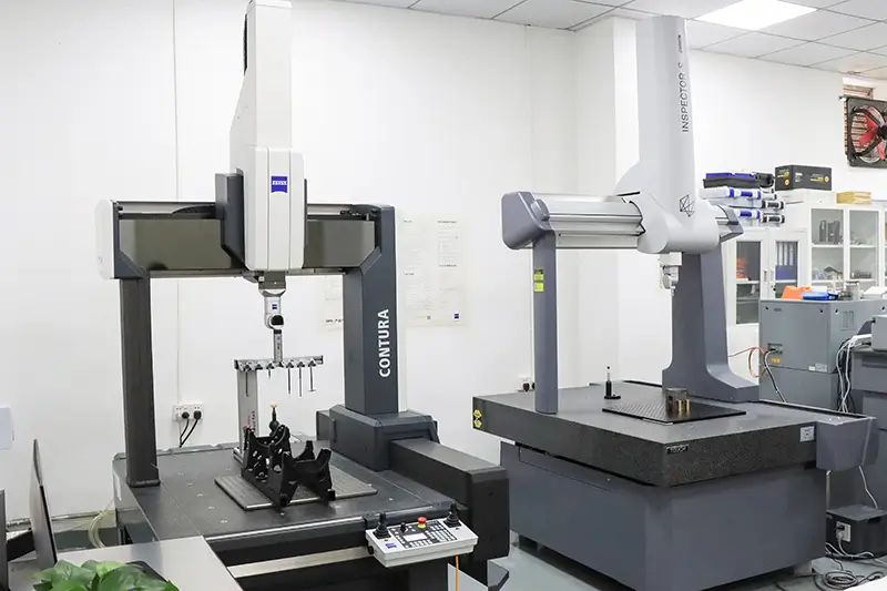 KaiSpeed quality engineer using a coordinate measuring machine (CMM) to verify the tolerances of a machined robotic component.